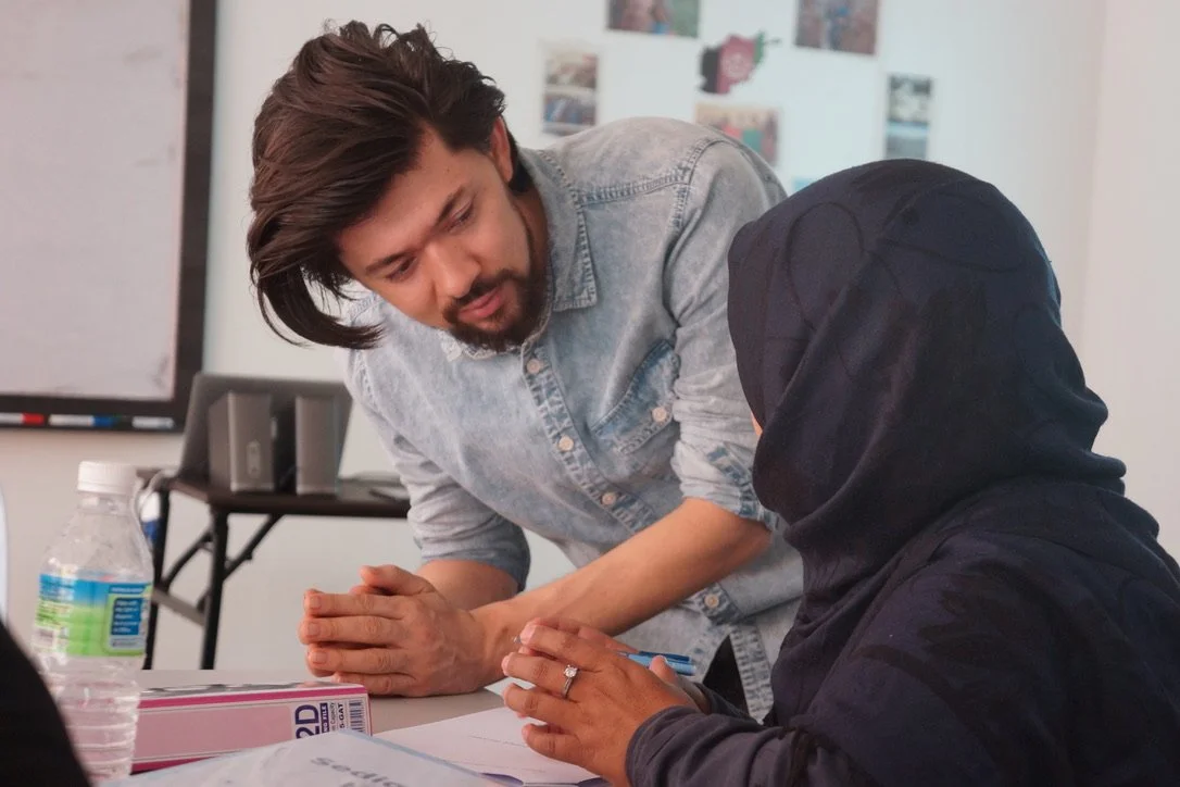 A Talenpac coach mentoring a refugee participant